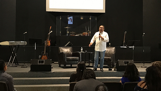 Rev. Calusay speaks to SAGU AIC students